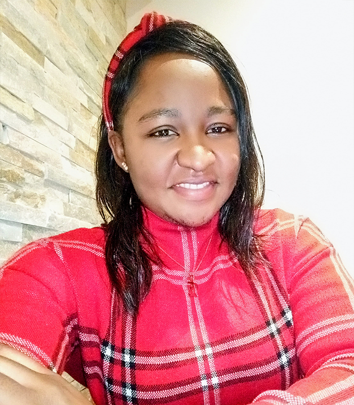 Ethel with a bright smile